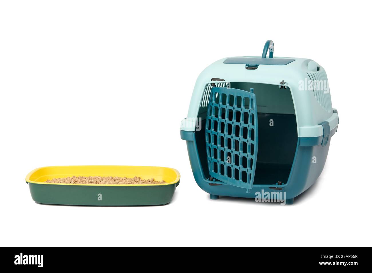 large plastic carrier cage for cats and dogs and cat litter box filled