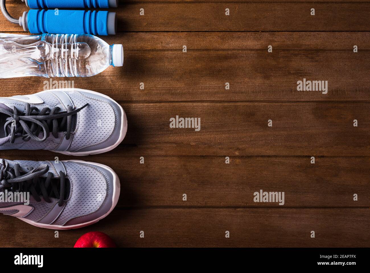 Premium Photo  Blue jump rope and sneakers on the wooden floor