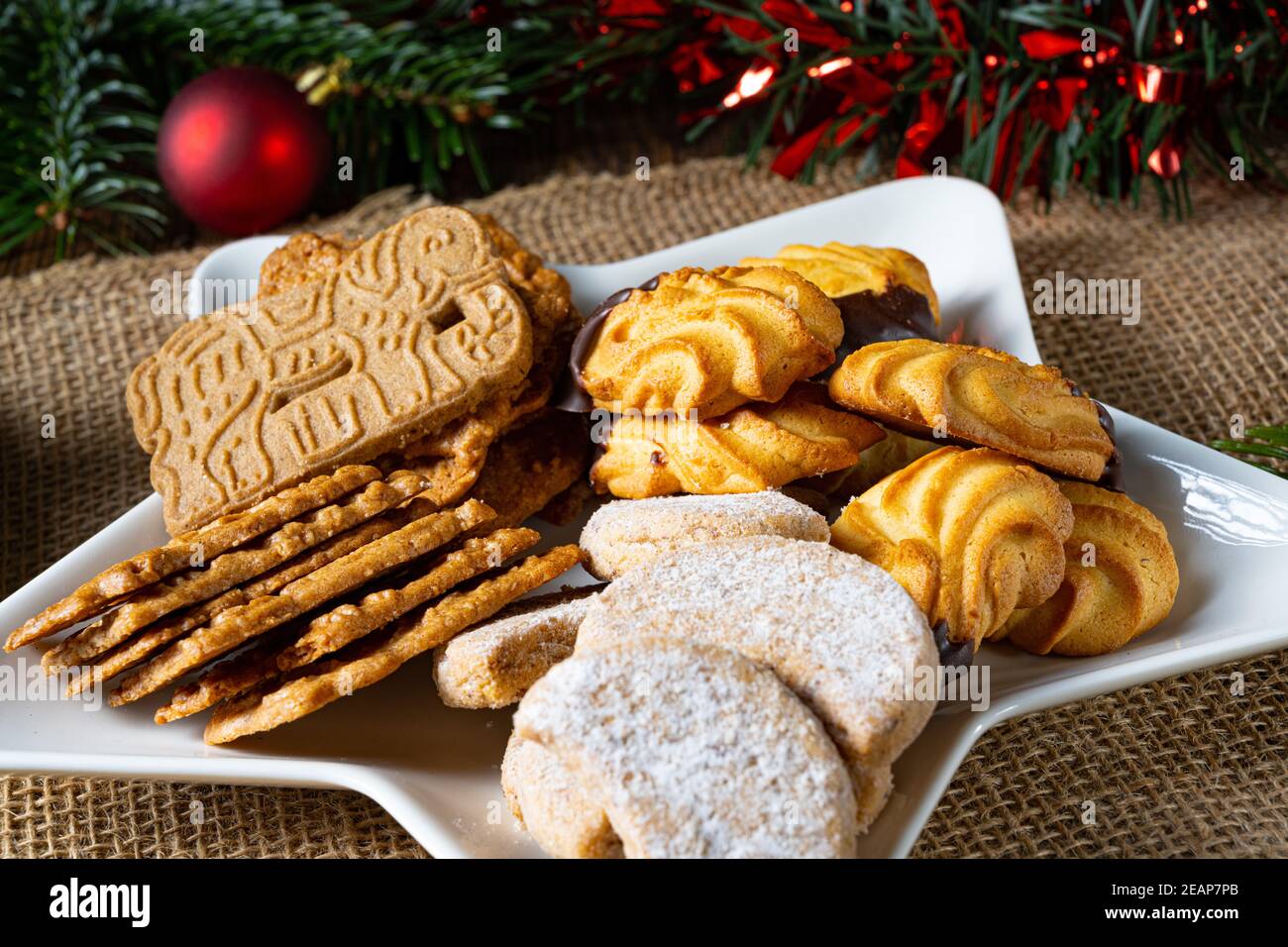 Different types of biscuits with rustic Christmas decorations Stock Photo