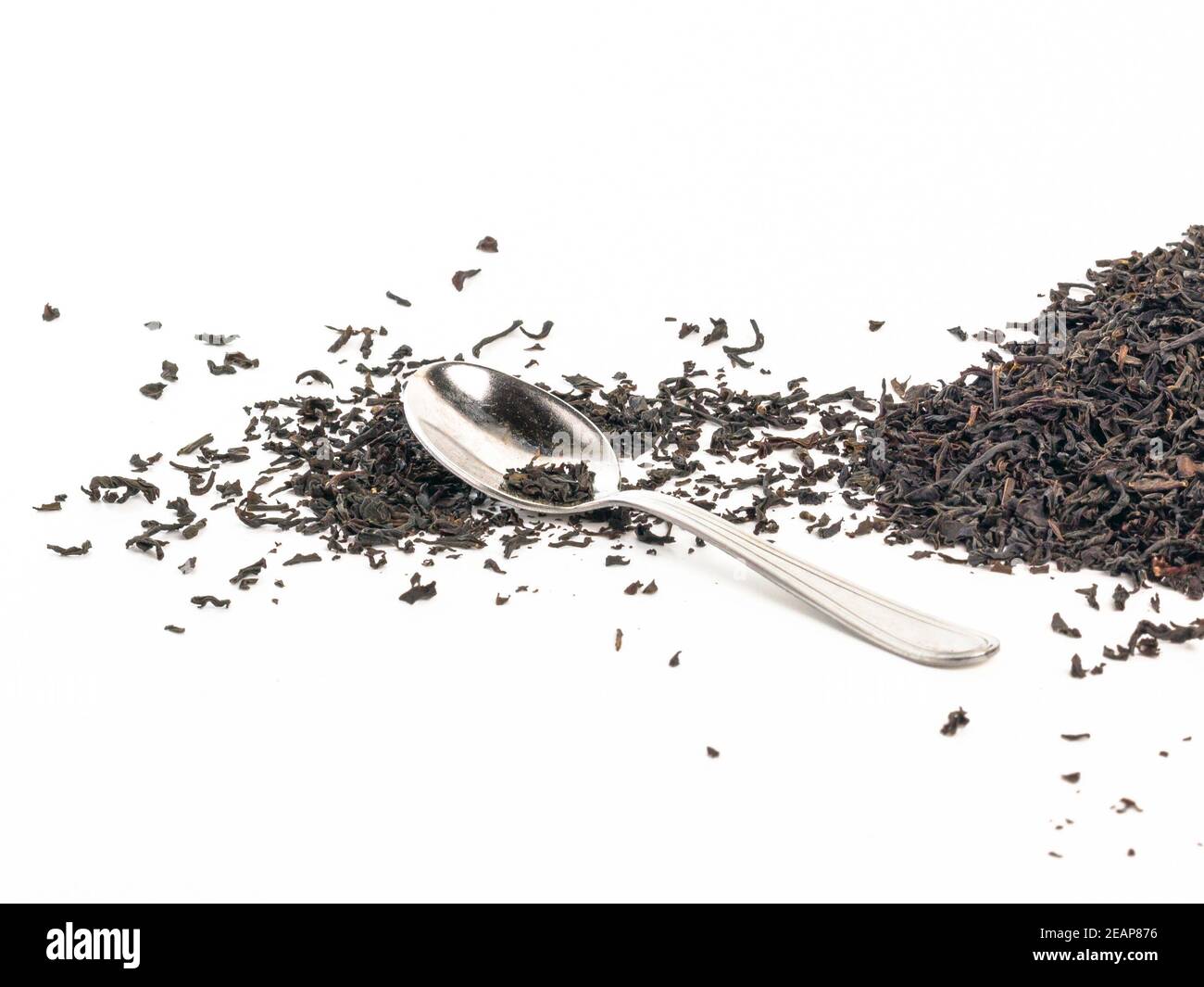 Spoon with leaves of tea Stock Photo Alamy