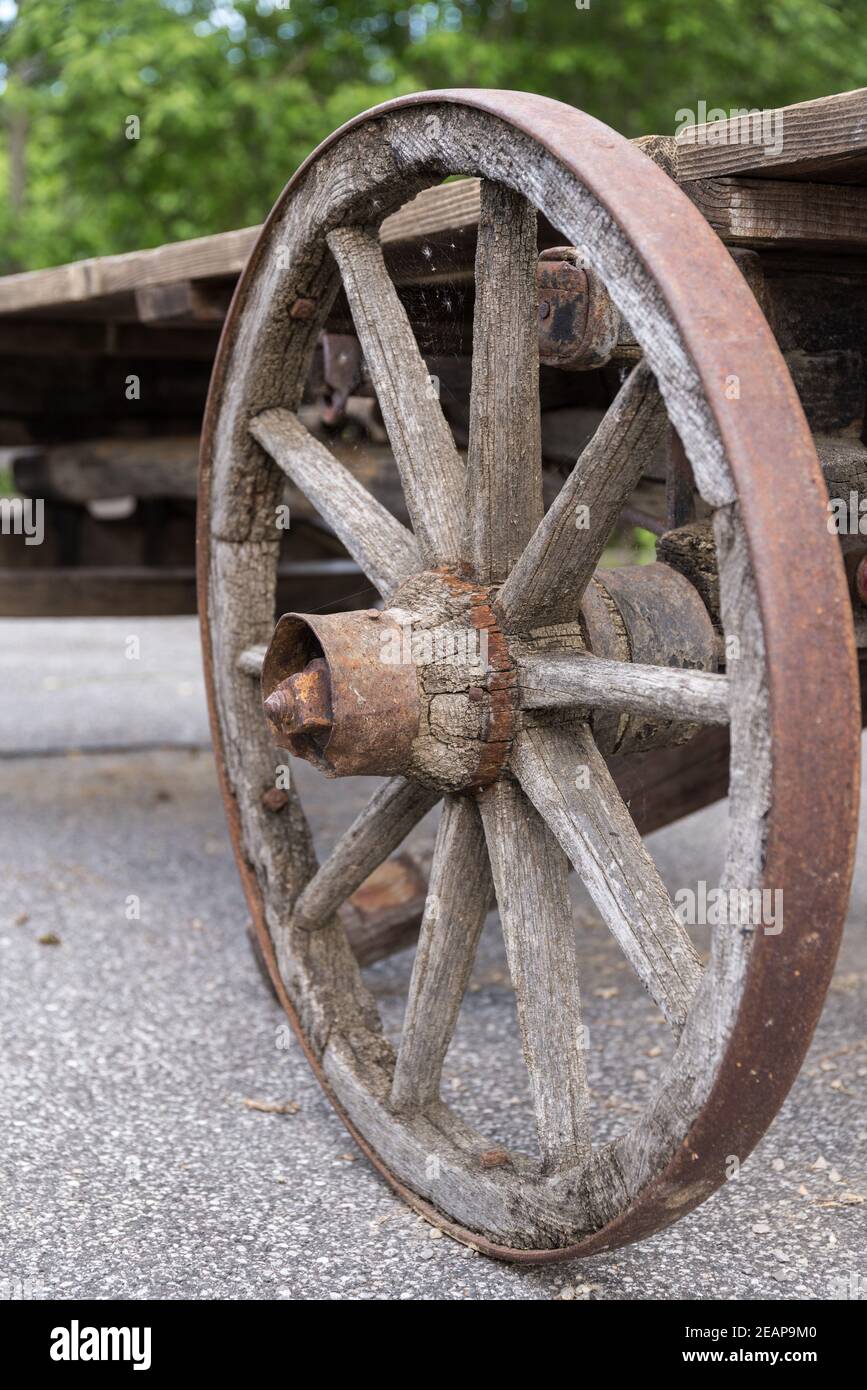 old wooden wagon wheel - cart Stock Photo