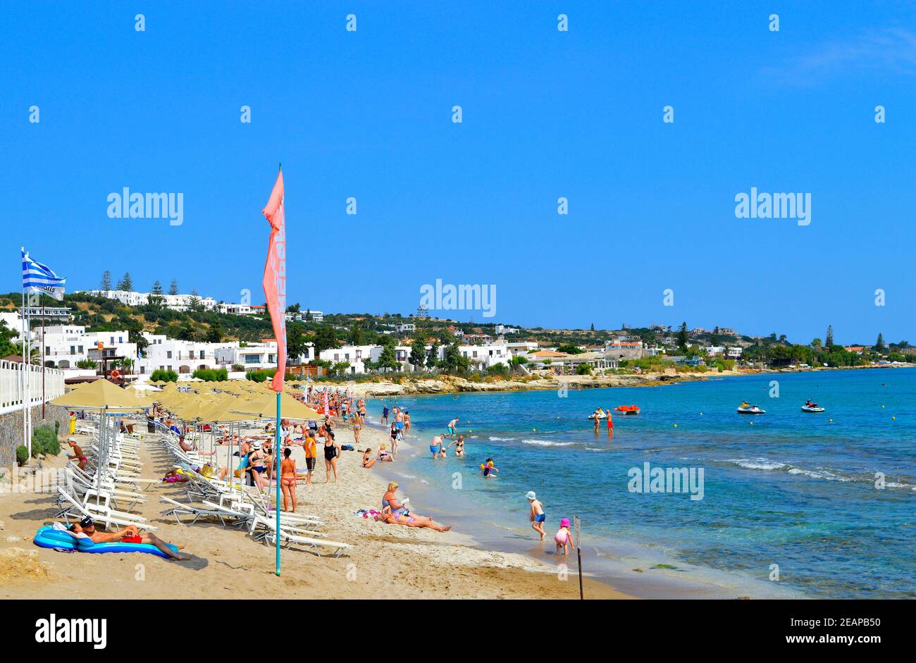 Tourists on Hersonissos beach in Crete the largest and most populated ...