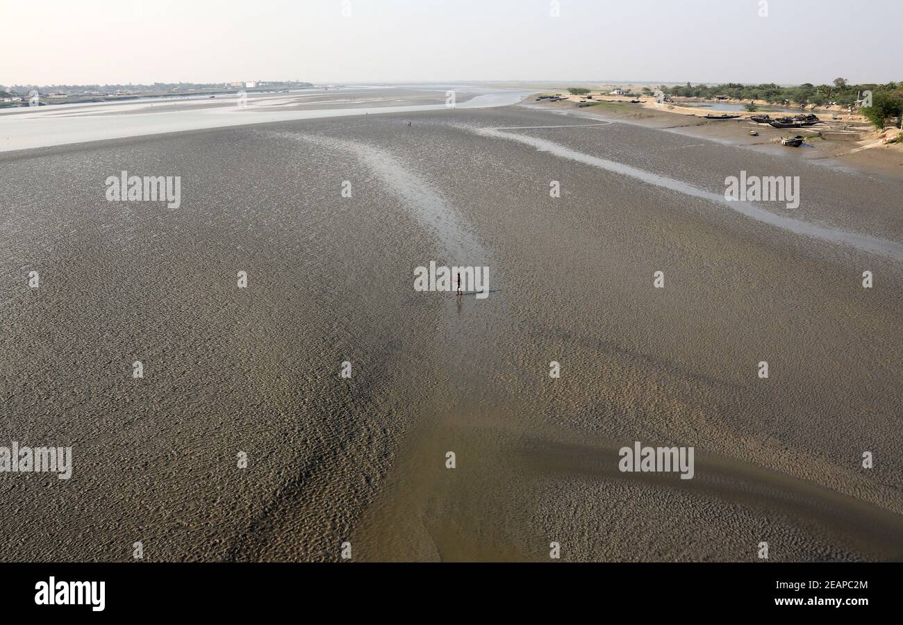Mud beds on the river Matla during low tide the water in the Canning Town, India on February 13, 2014. Stock Photo