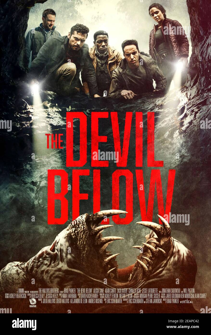 The Devil Below (2021) directed by Bradley Parker and starring Adan Canto, Will Patton and Jonathan Sadowski. A geological expedition to an Appalachian sinkhole becomes a fight for survival against a mysterious force. Stock Photo