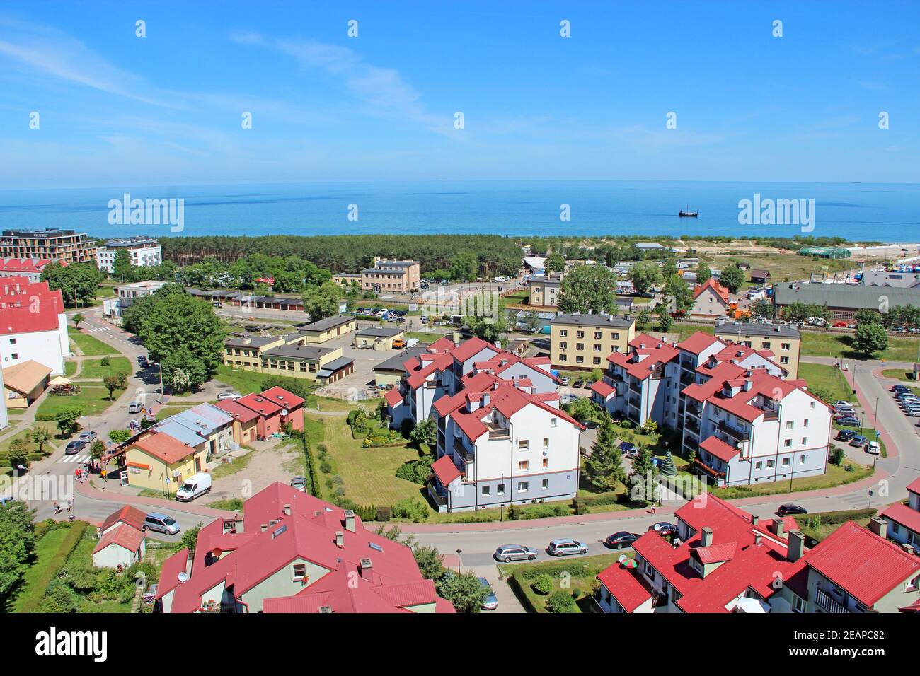 cityscape of Wladyslawowo town from above with streets houses cars and sea Stock Photo