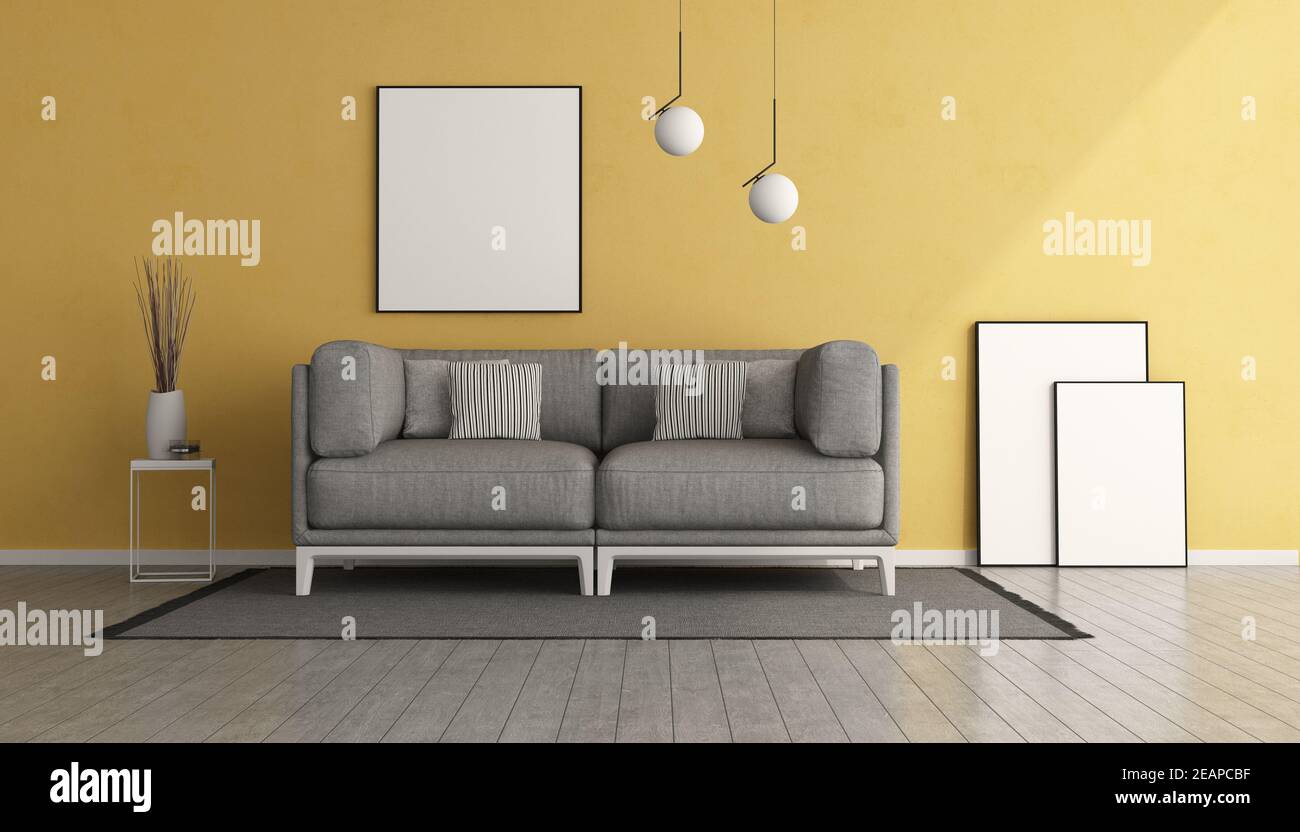 Yellow living room with gray sofa Stock Photo