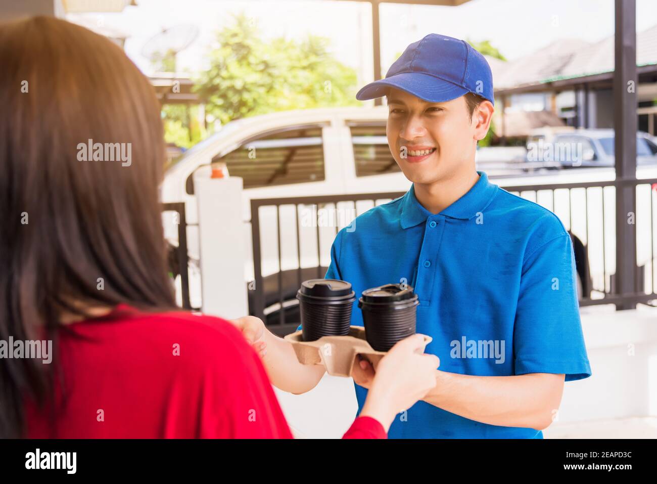 Asian young guy carry or take something, full length model isolated on