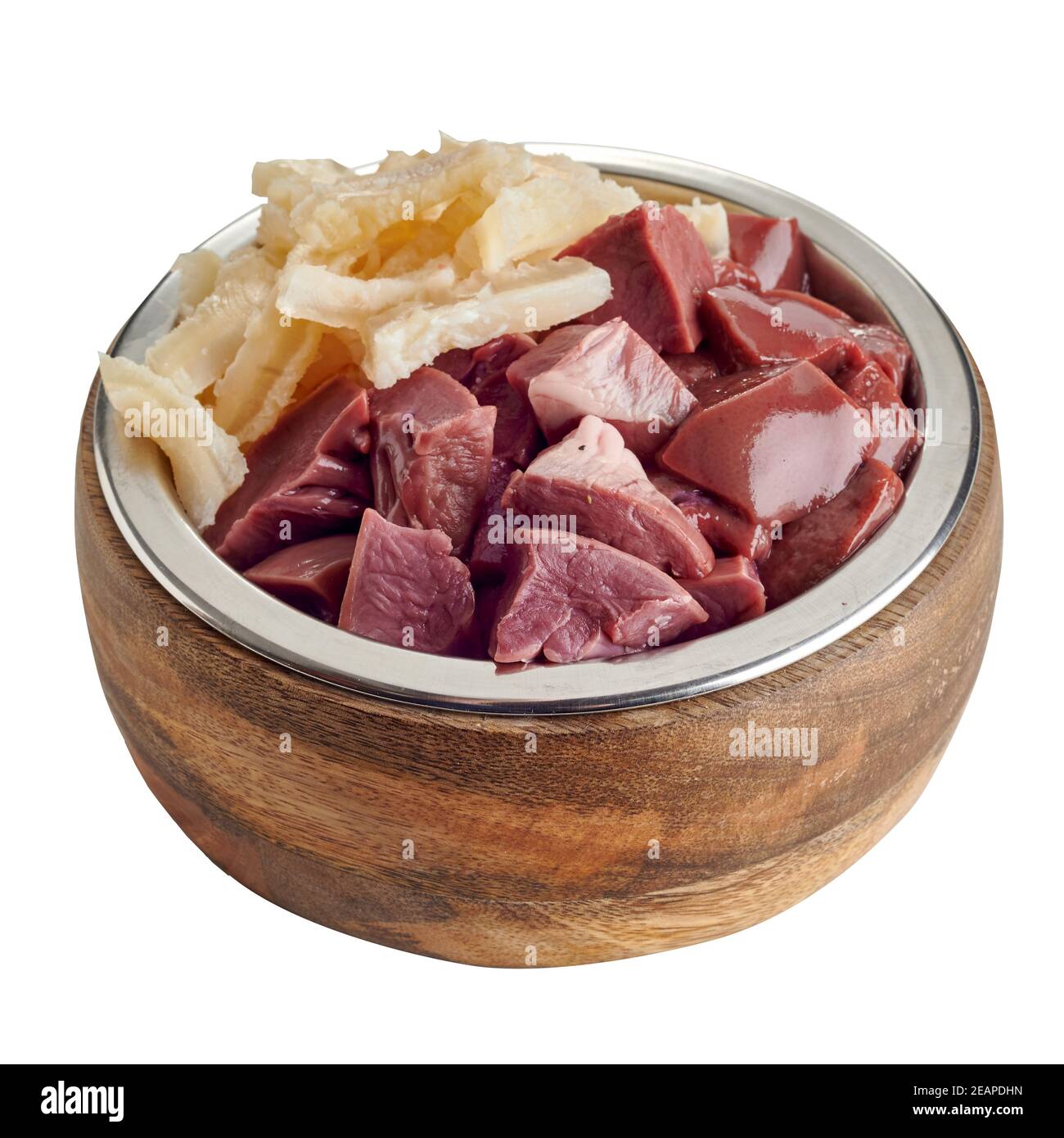 Ideal pet nutrition concept for dogs and cats with fresh offal or barf including raw liver, pluck and tripe in a metal and wood bowl isolated on white Stock Photo