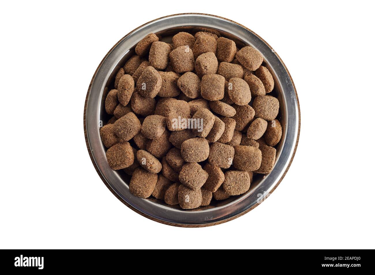 Bowl full of dried biscuits or pellets for animals to provide a balanced diet for your pet dog or cat in a top down view isolated on white Stock Photo