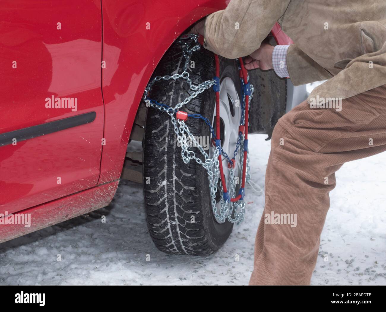 Car on icy road and chains hires stock photography and images Alamy