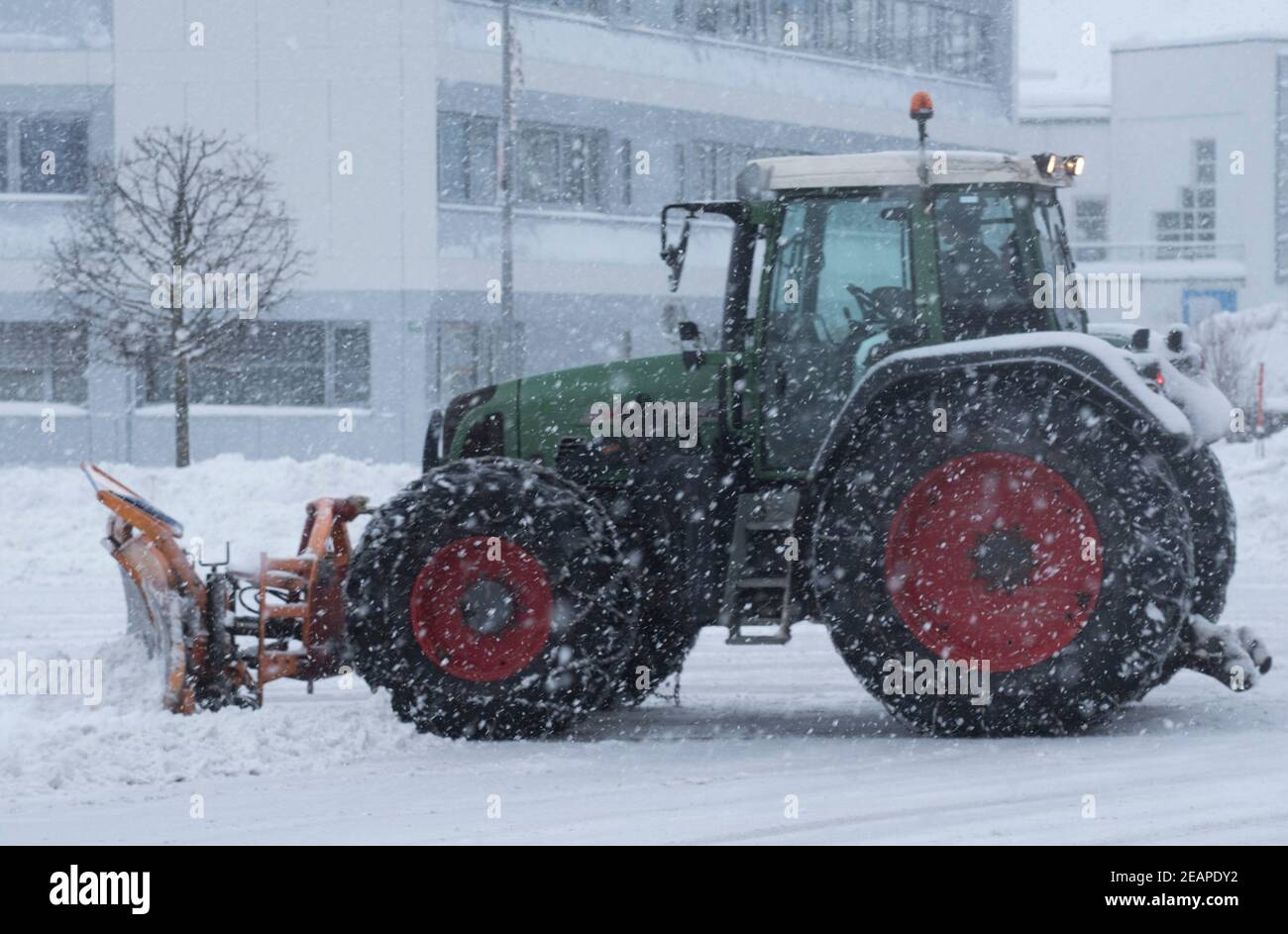 snow removal at the parking lot Stock Photo Alamy