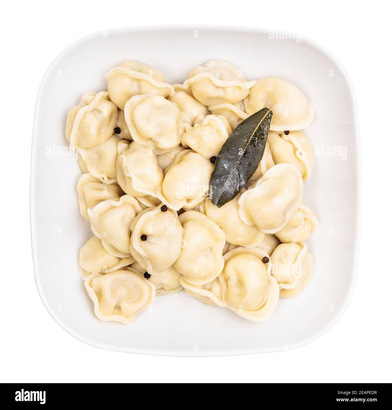 top view of boiled Pelmeni in gray bowl isolated Stock Photo