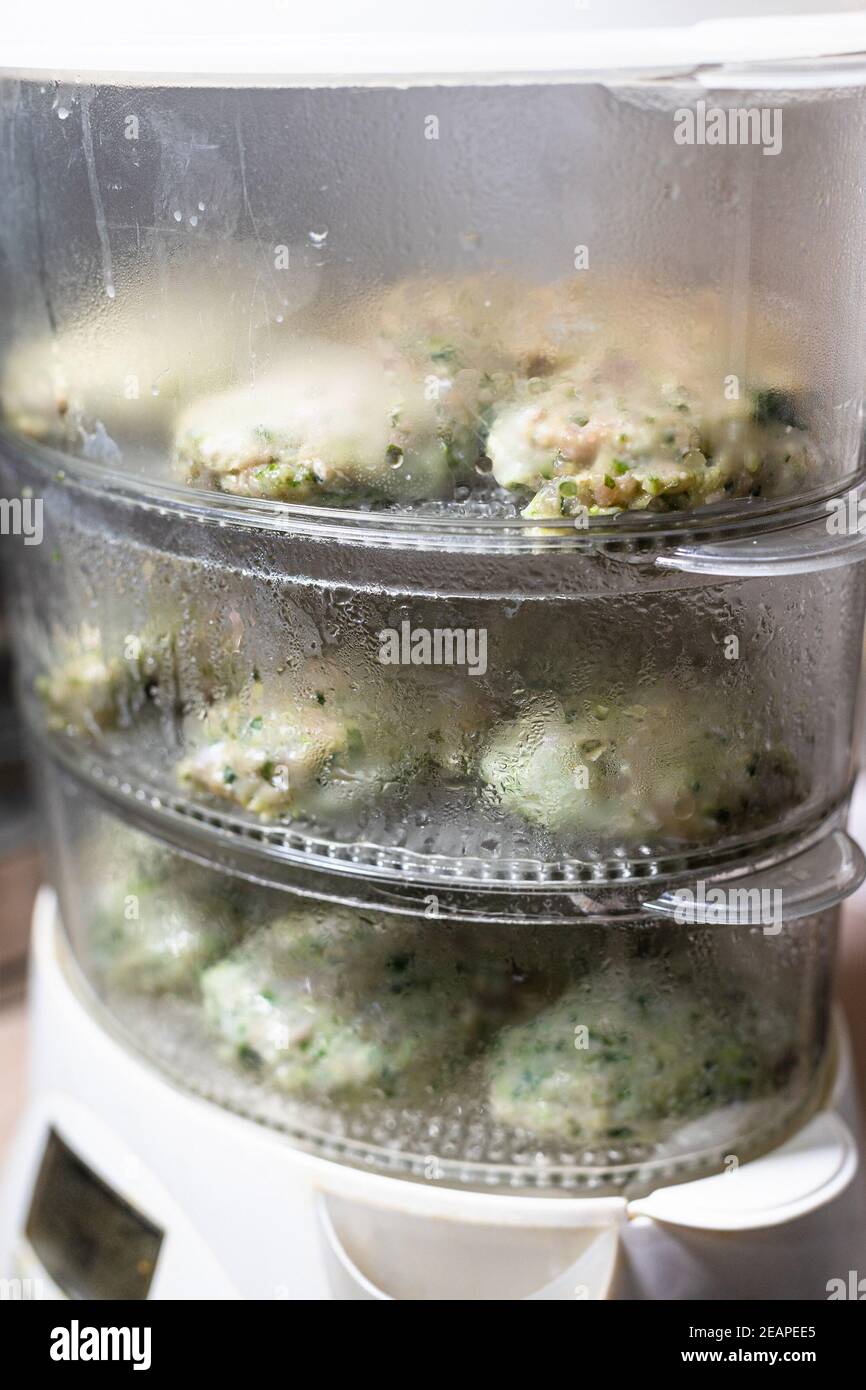 electric steamer with cooking chicken cutlets Stock Photo Alamy