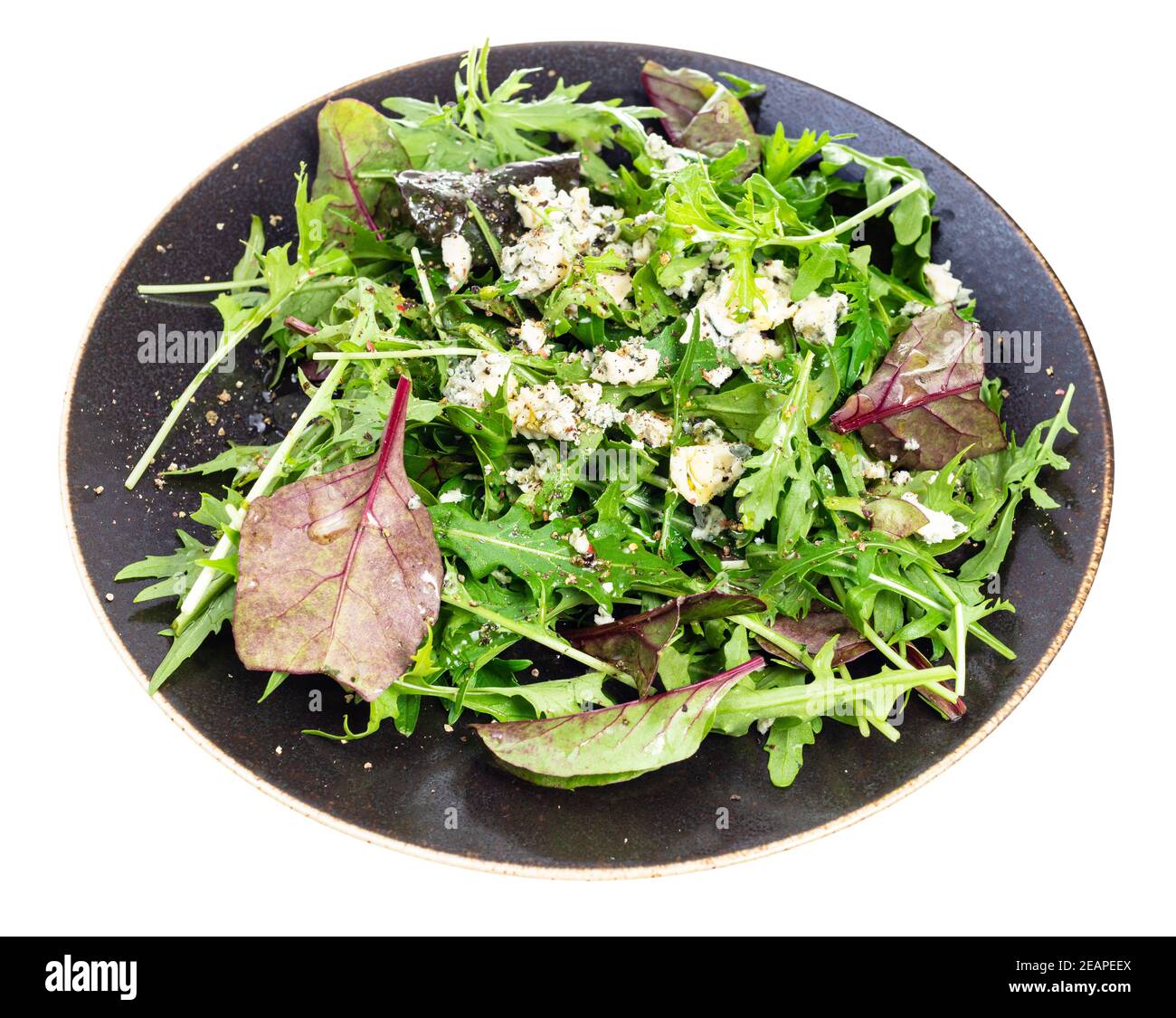 green salad with blue cheese on plate isolated Stock Photo
