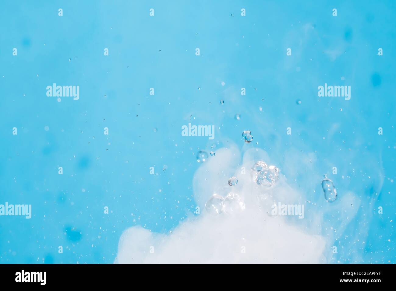 Water drop. Chemical reaction with boiling swirling water splashes