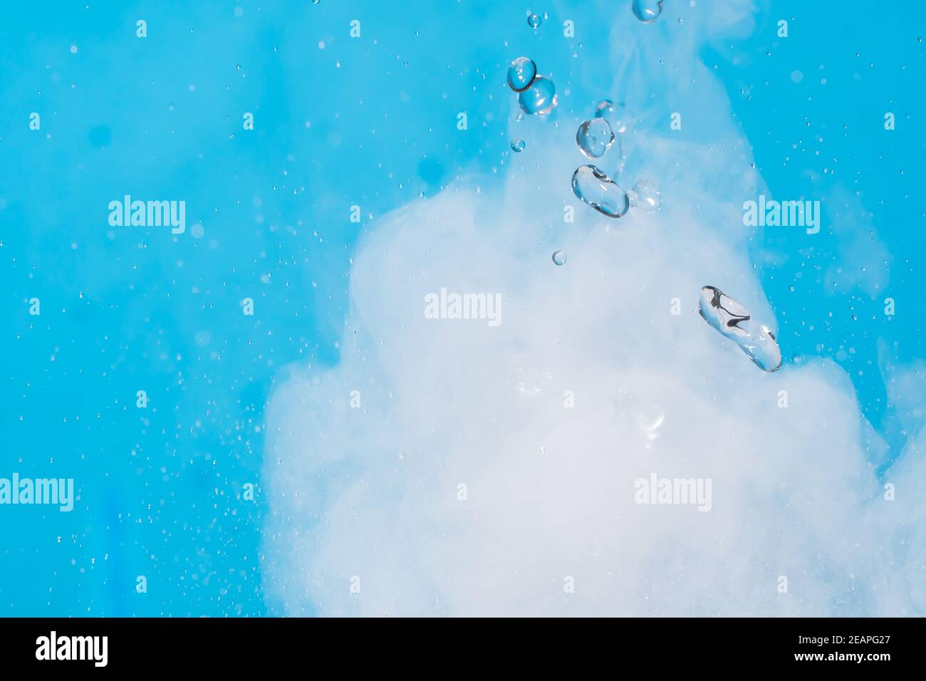 Water drop. Chemical reaction with boiling swirling water splashes