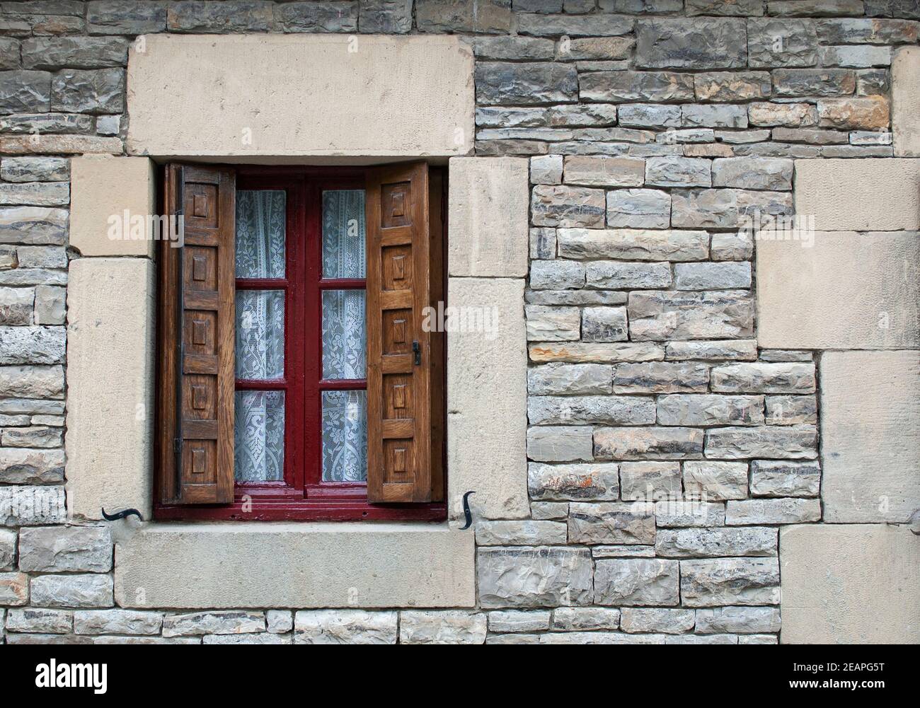 window on the facade of chalet Stock Photo