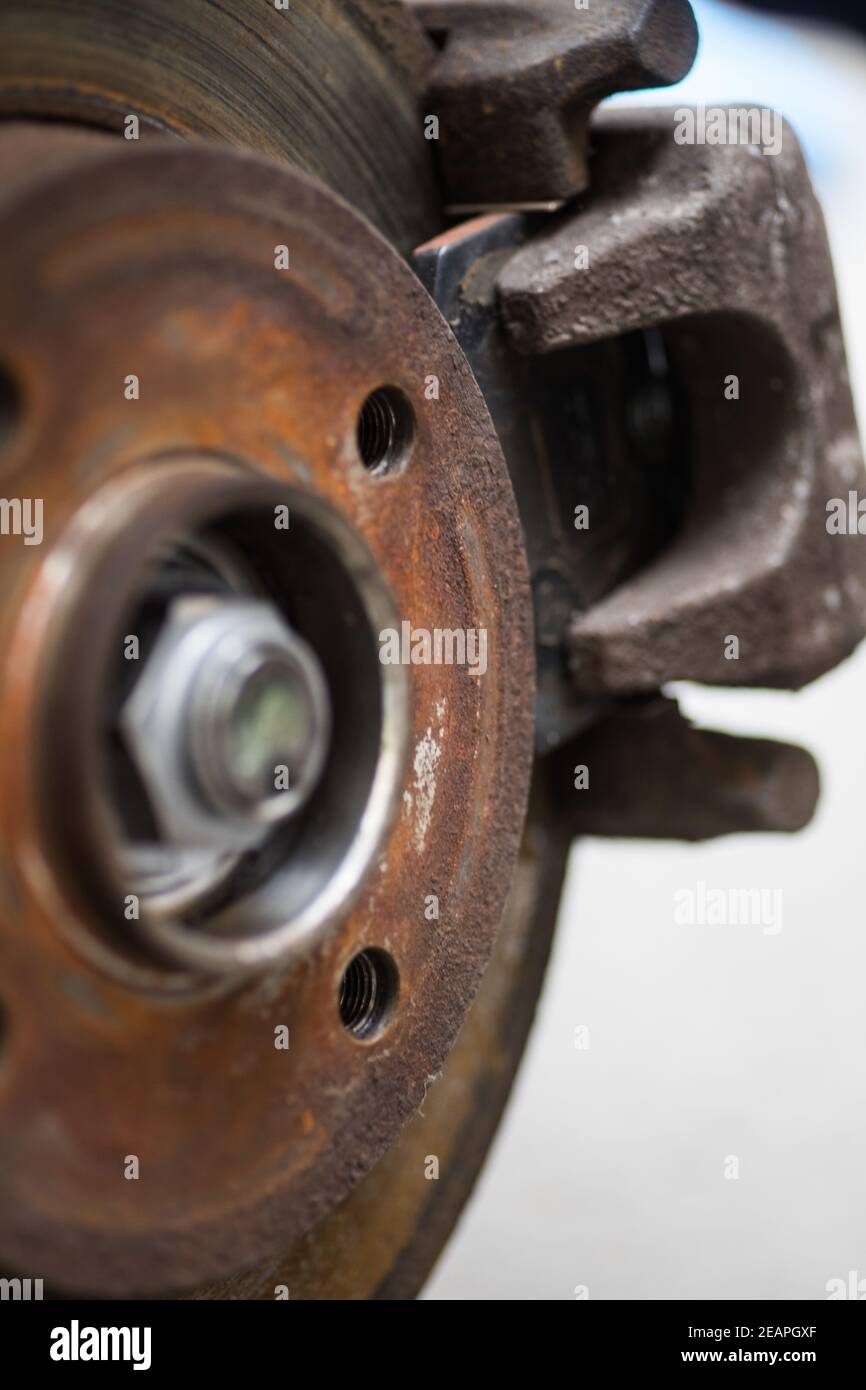 Car worn and rusty brake disk and caliper Stock Photo Alamy