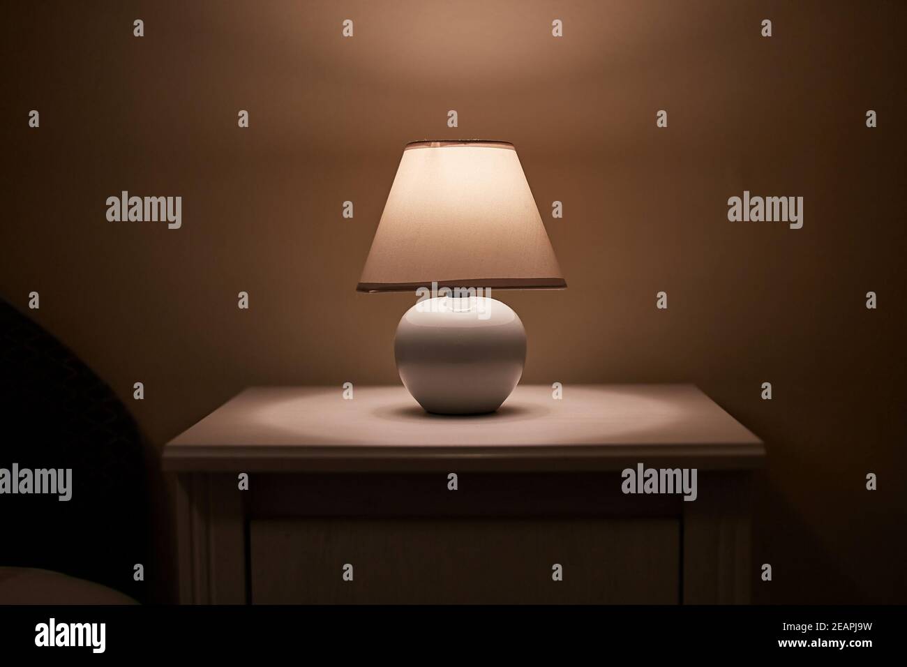 Lamp on a nightstand Stock Photo Alamy