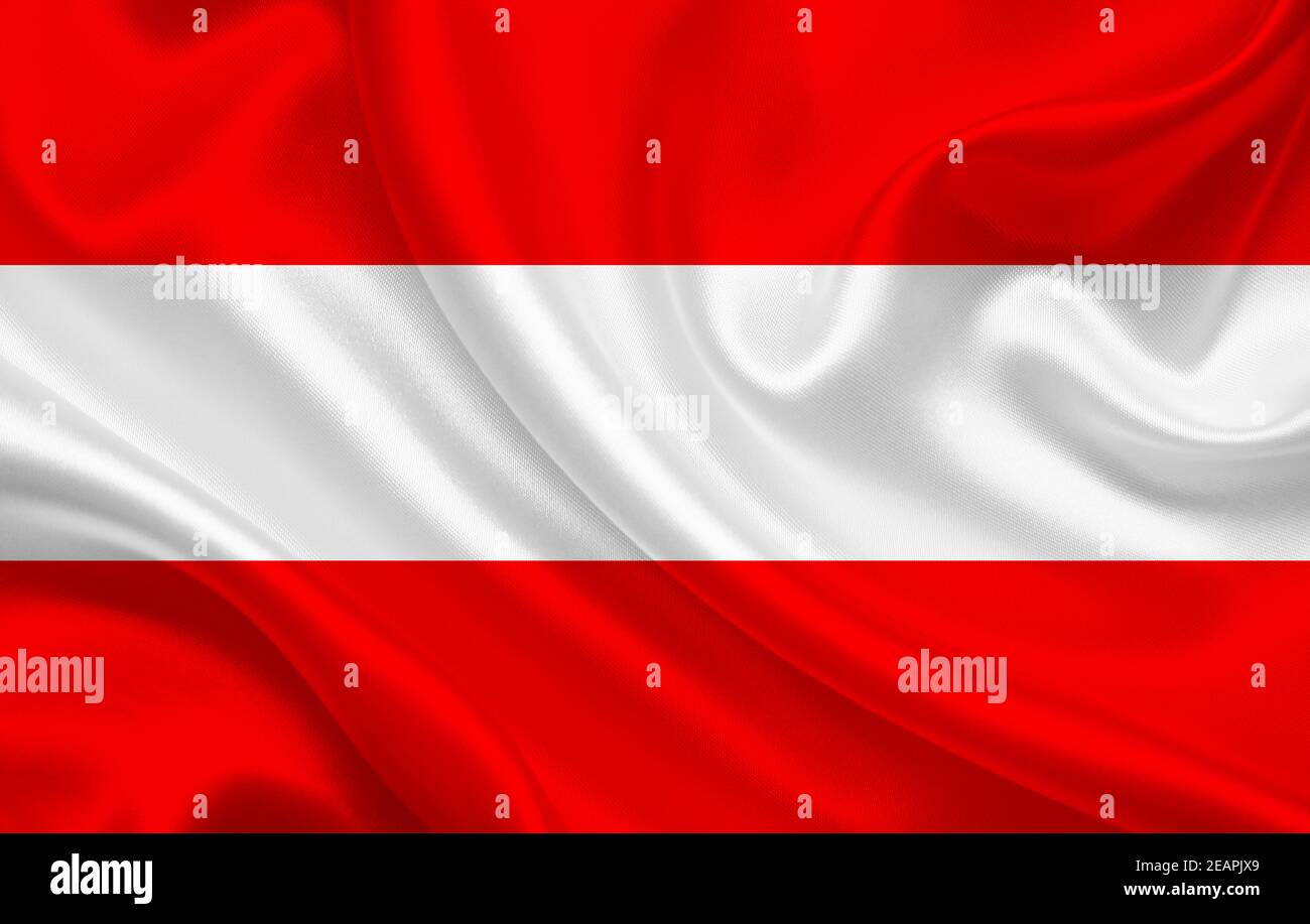 Austria country flag on wavy silk fabric background Stock Photo