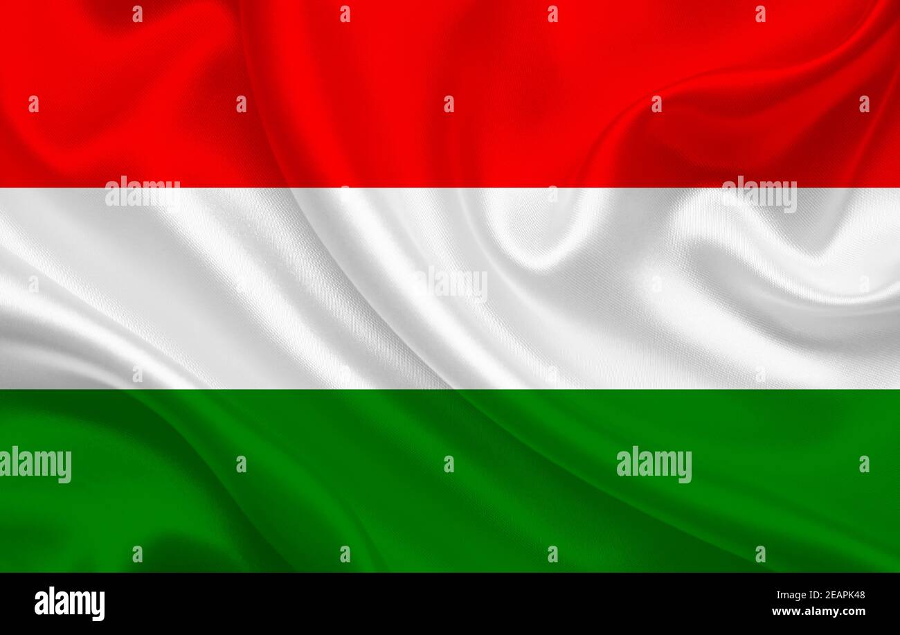 Hungary country flag on wavy silk fabric background panorama Stock Photo
