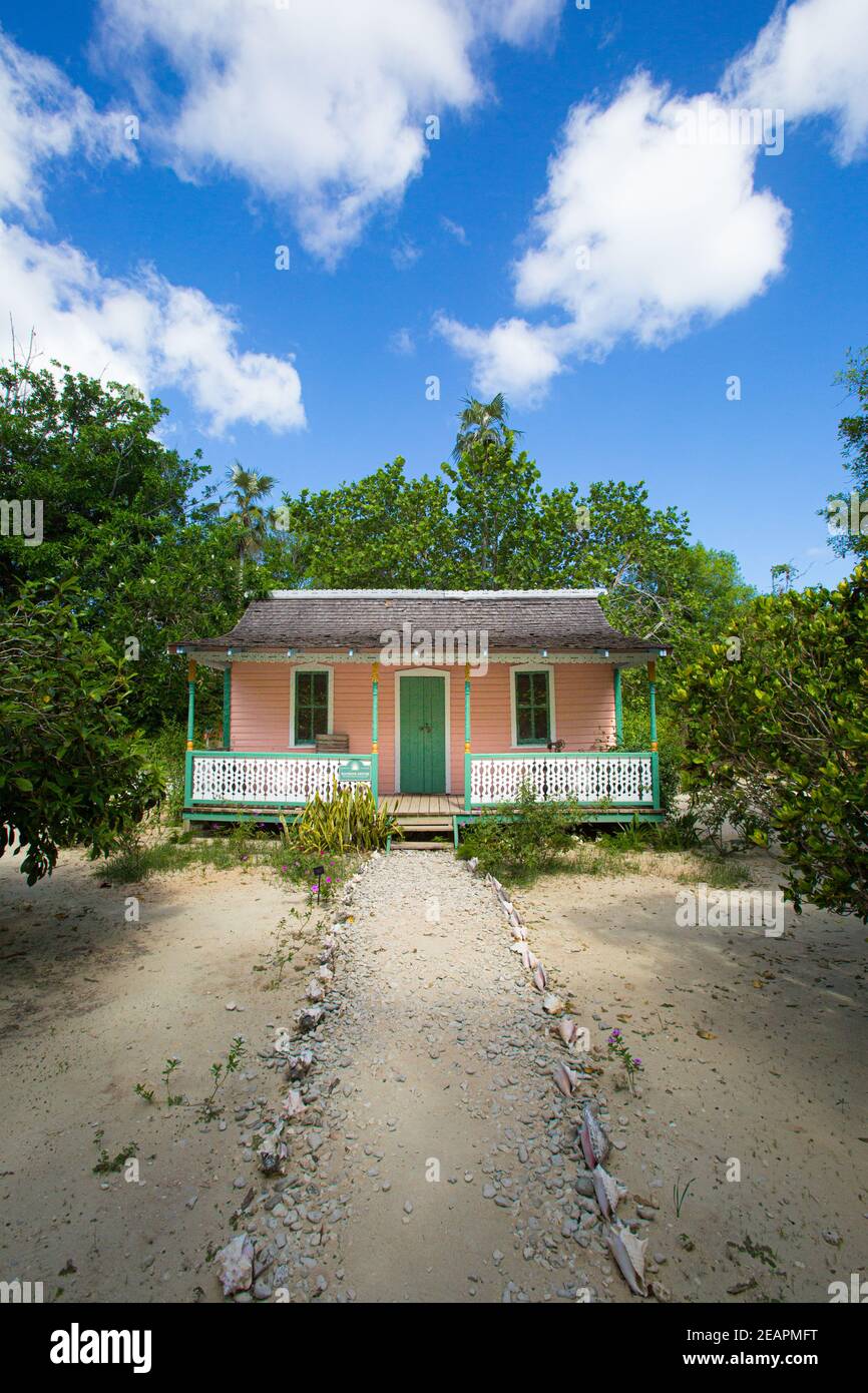 Traditional colorful Cayman house, with sand garden. Queen Elizabeth Botanic Gardens. Grand Cayman, Cayman Islands Stock Photo