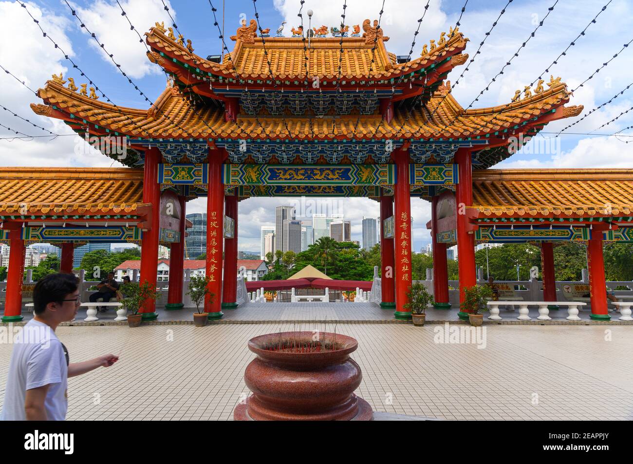 Main Gate at the Goddess of Mercy Temple looking over high rise buildings in Kuala Lumpur Stock Photo