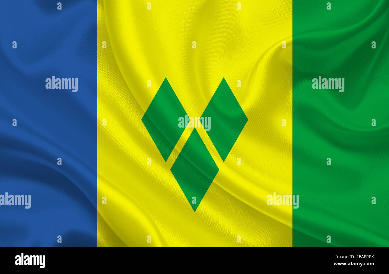 Flag of Saint Vincent and the Grenadines country on wavy silk fabric panorama background Stock Photo