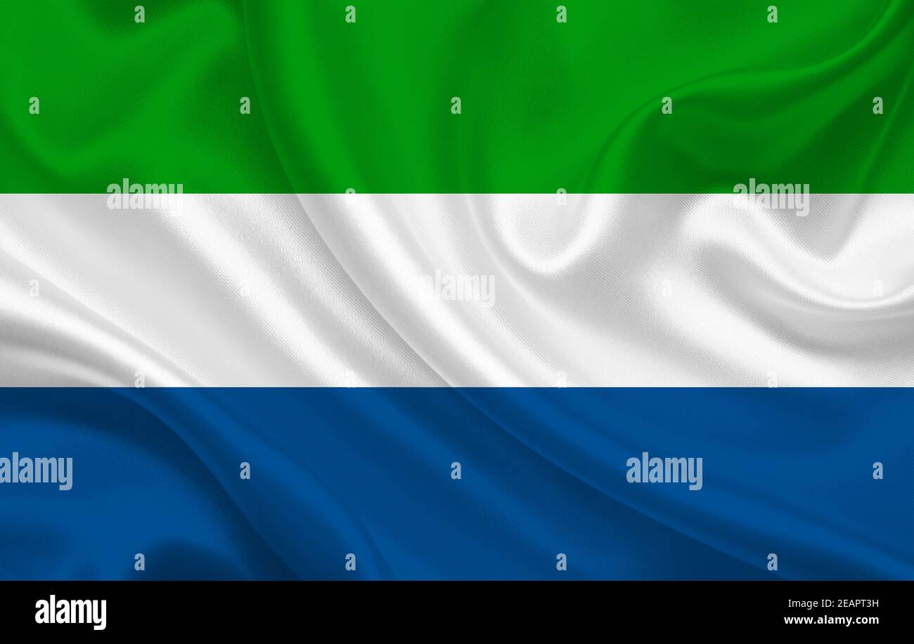 Sierra Leone country flag on wavy silk fabric panorama background Stock Photo