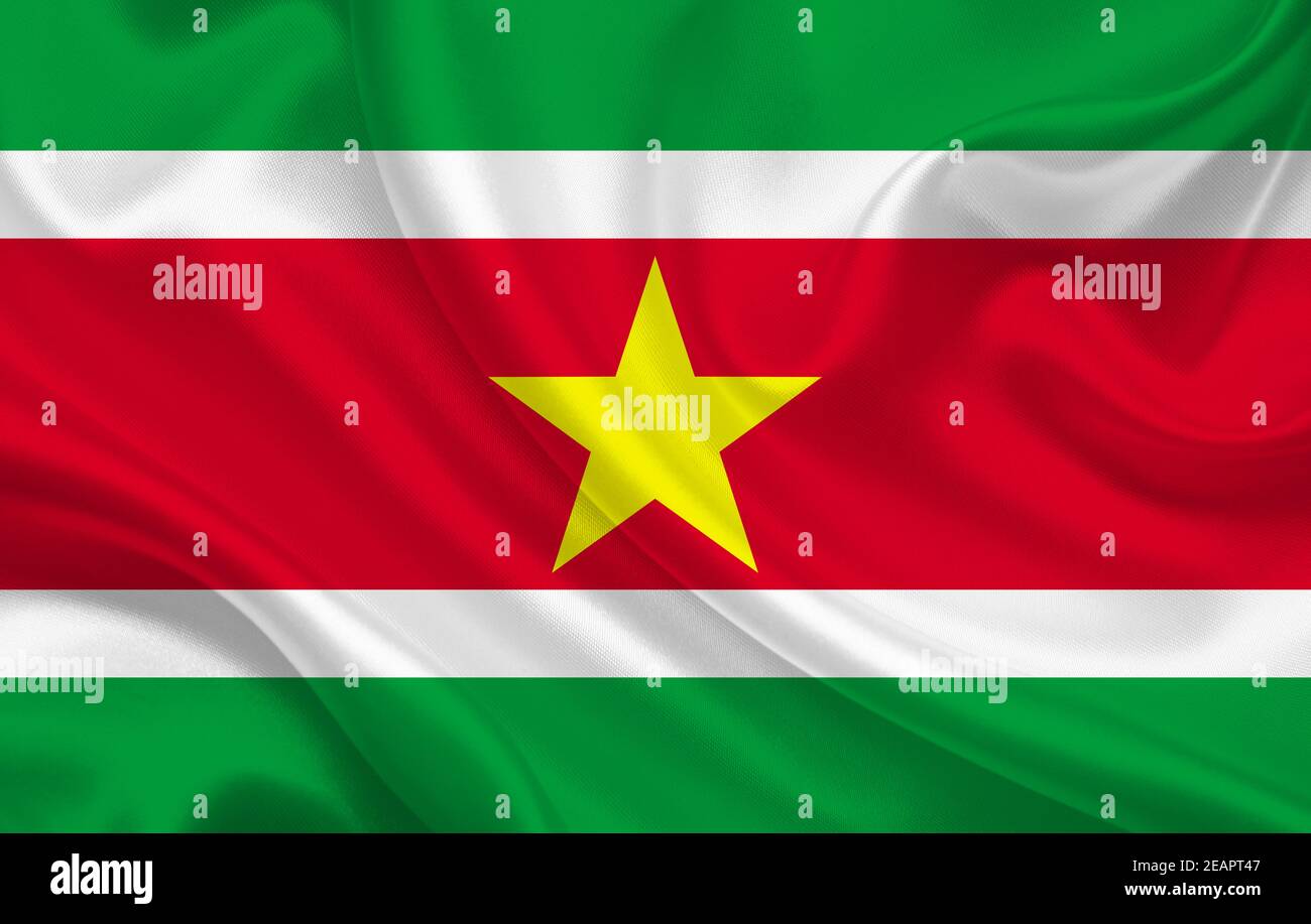 Suriname country flag on wavy silk fabric panorama background Stock Photo