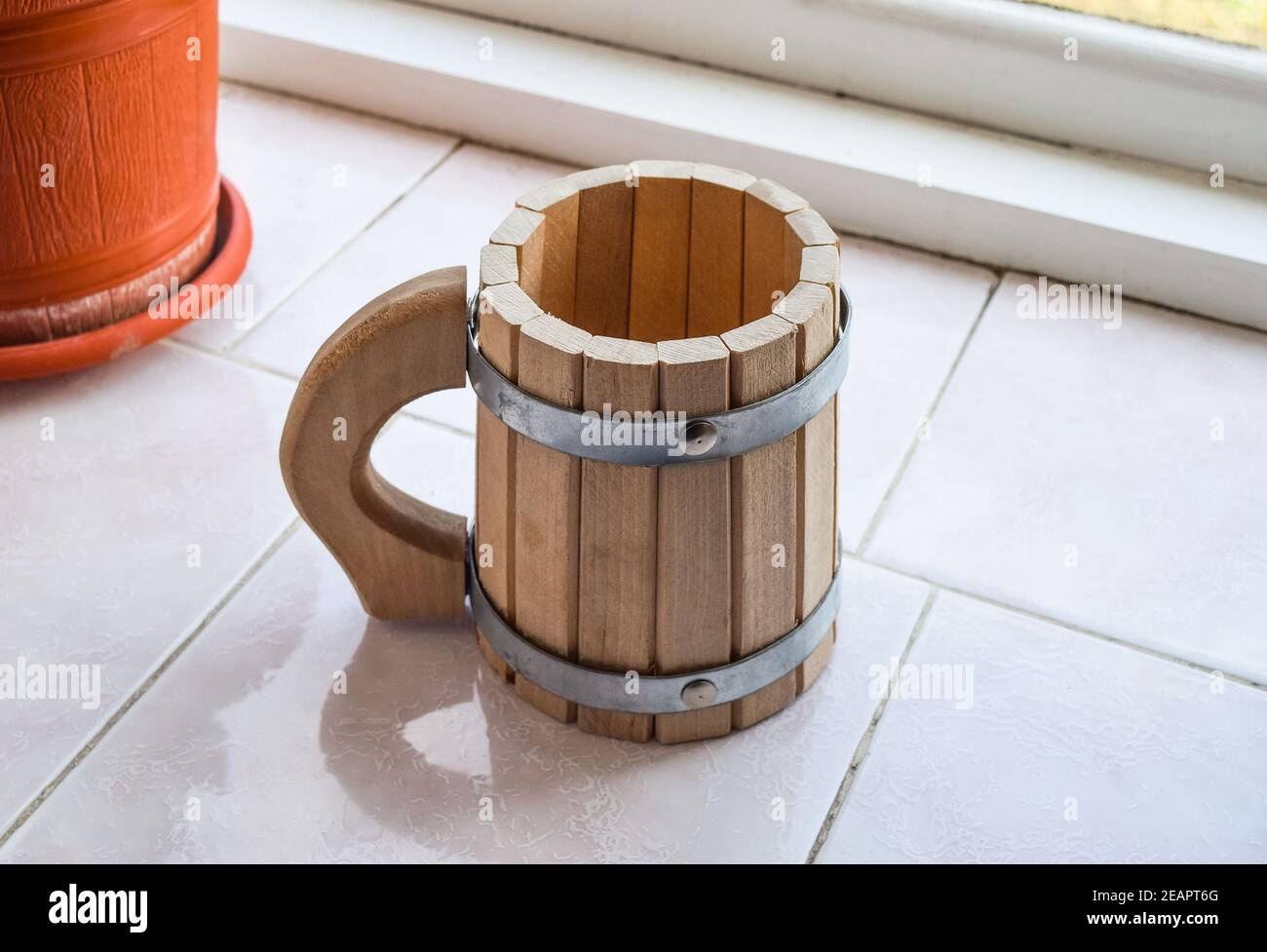 Decorative cup shaped drums. Wooden mug of beer Stock Photo