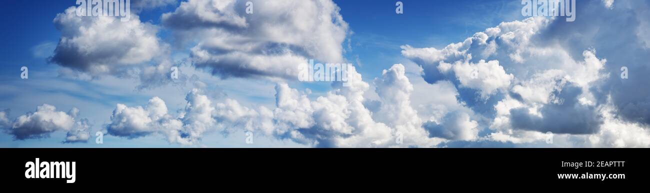white fluffy clouds on blue sky in summer Stock Photo