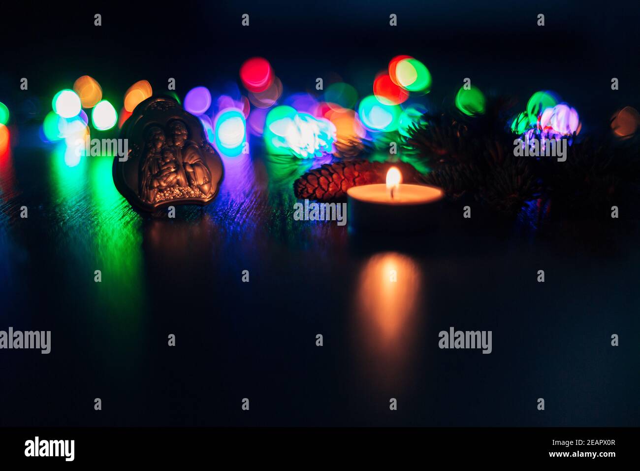 Christmas Composition of Church Icon on a Wooden Background With Multicolored Boken Stock Photo