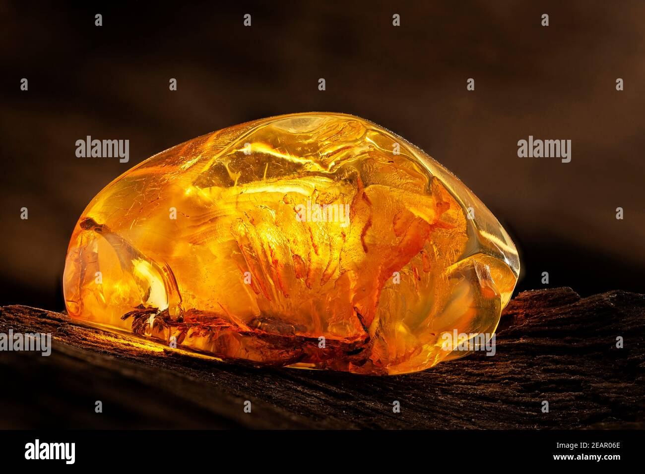 Beauty of natural raw amber. A piece of yellow transparent natural