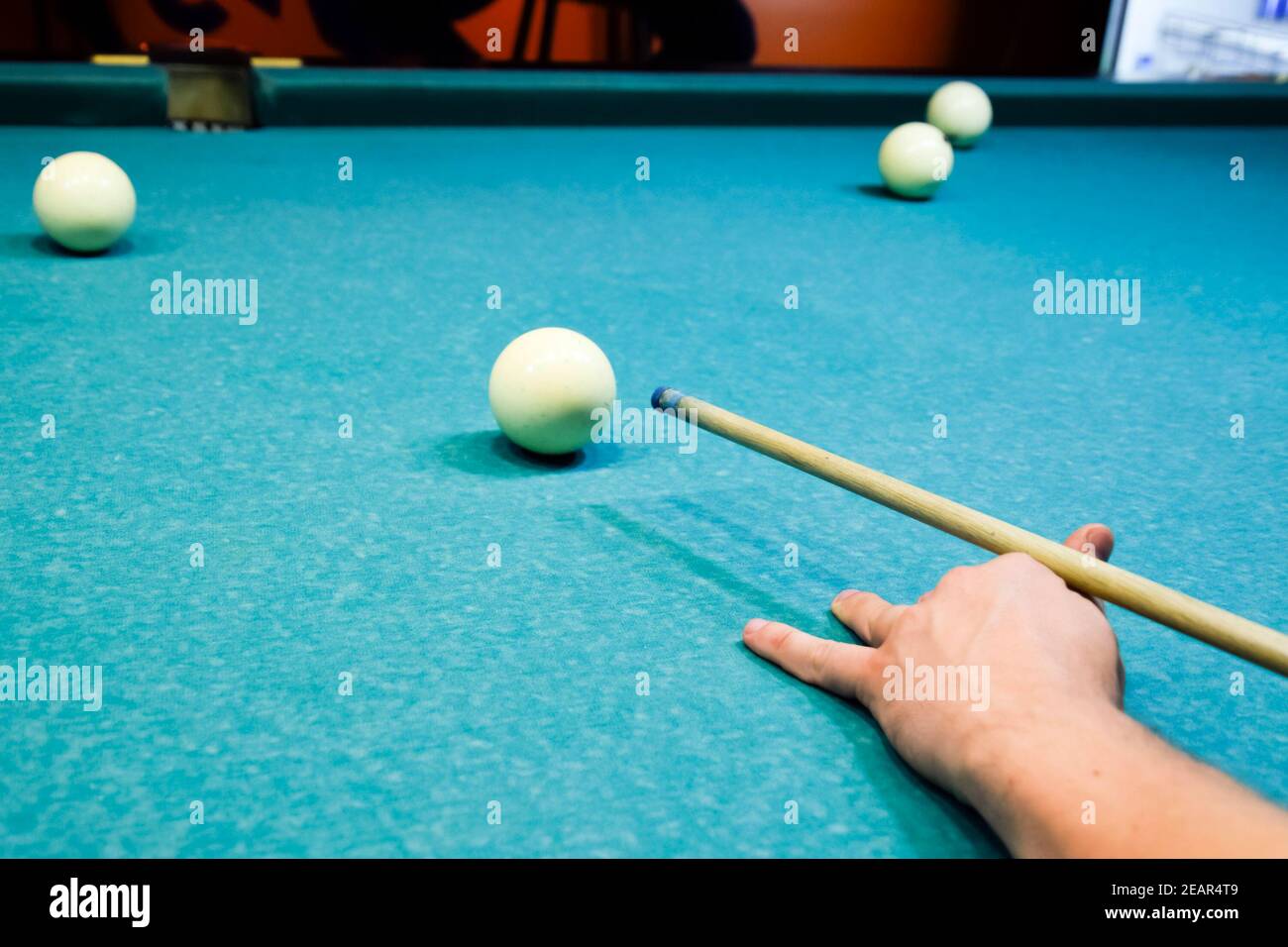 Billiards, billiard table. Targeting the cue in the ball for imp Stock Photo