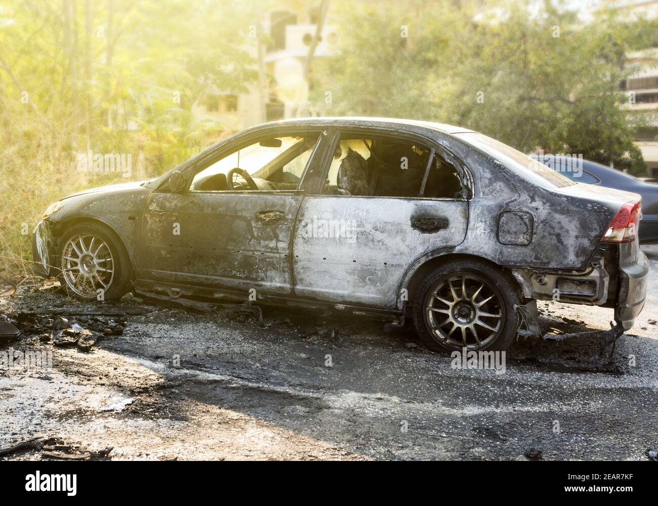 Burnt and damaged car body Stock Photo