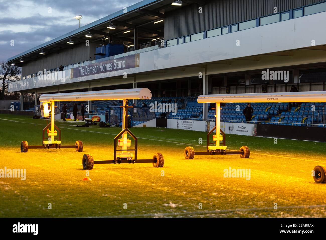 Solihull, West Midlands, UK. 10th Feb, 2021. Just an hour before the Womens Super League game between rivals Birmingham City FC and Aston Villa kicks off, an icy pitch is being defrosted by special heatiing machines. Temperatures are likely to be minus 5 degrees for the game. Credit: Peter Lopeman/Alamy Live News Stock Photo