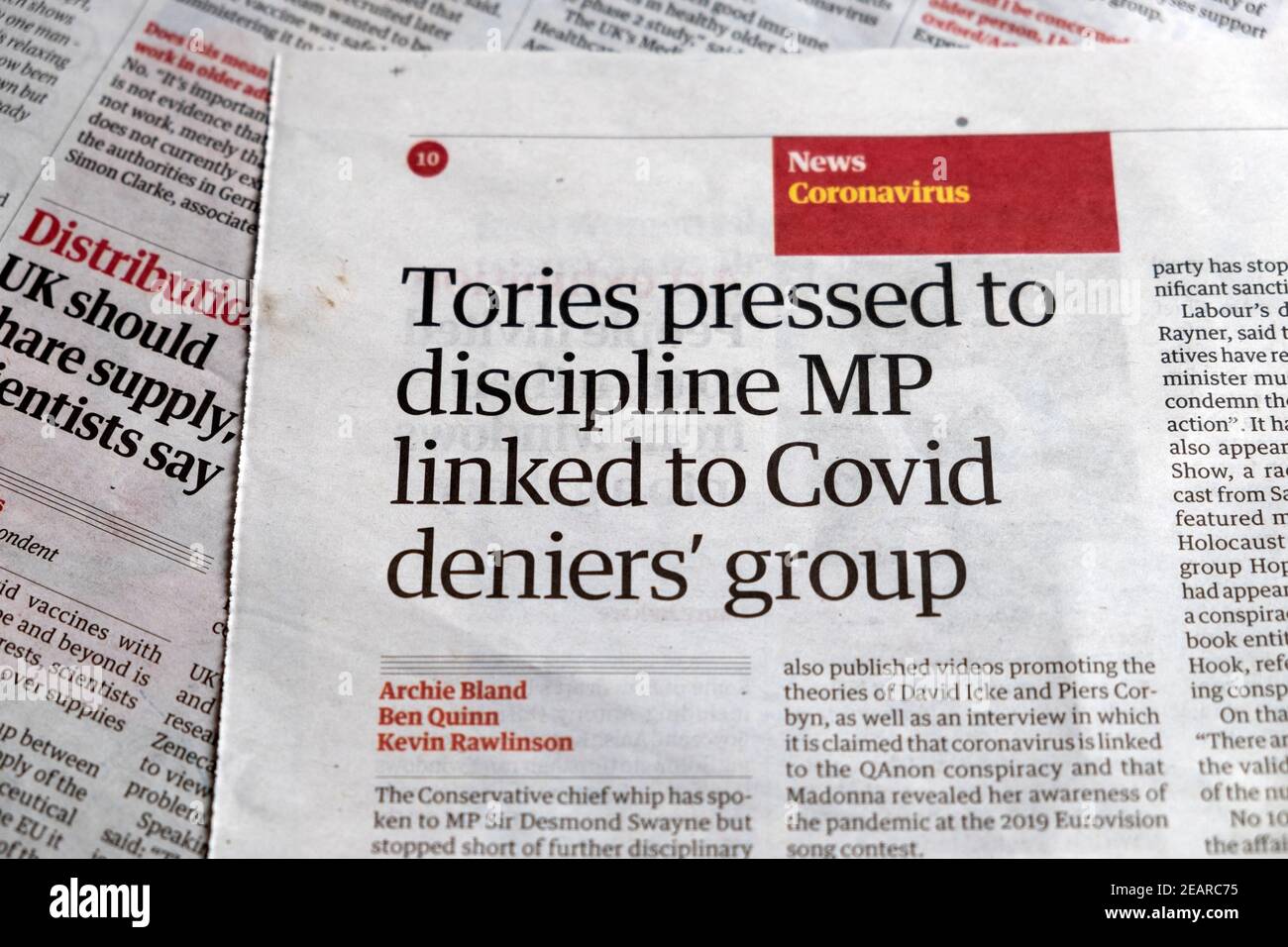 'Tories pressed to discipline MP linked to Covid deniers' group' Guardian newspaper headline article inside page article 28 January 2021 London UK Stock Photo