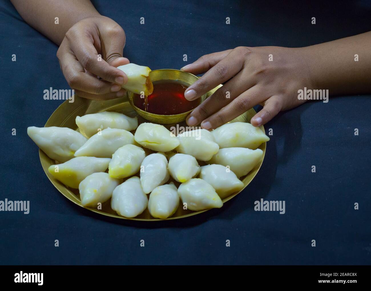 delicious bengali rice flour coconut dumpling served during bengali