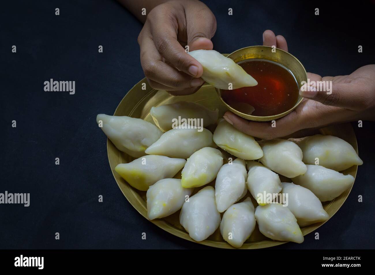 delicious bengali rice flour coconut dumpling served during bengali