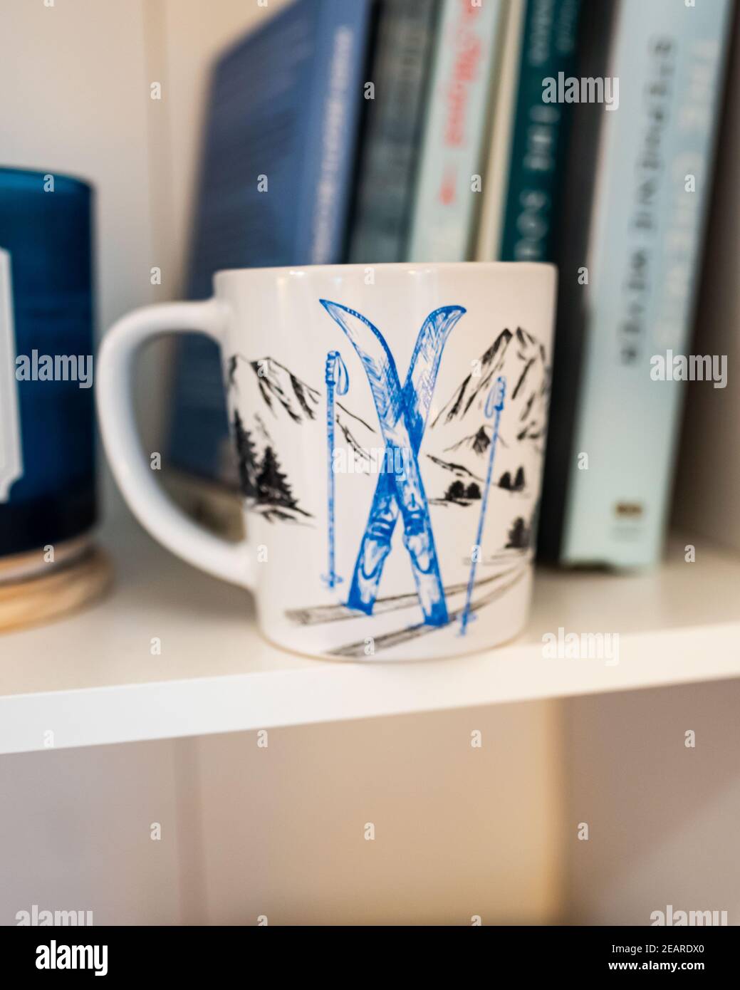 White Outdoorsy Coffee Mug with Mountains Stock Photo
