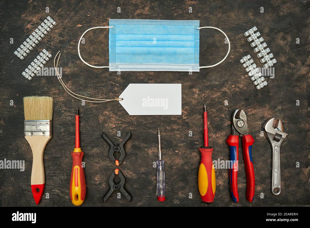 Tools and masc for work with covid season Stock Photo