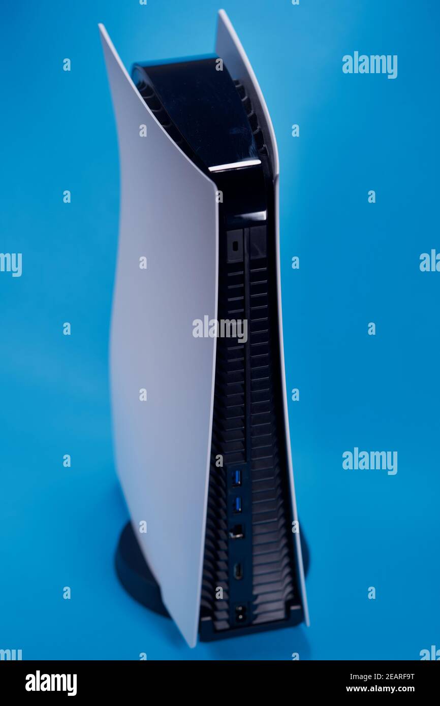 PS5 gaming console on blue background. Photo taken February 6th, Zurich,  Switzerland Stock Photo - Alamy