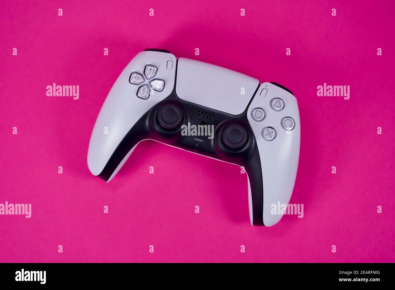 PS5 Controller on pink background. Photo taken February 6th, 2021, Zurich,  Switzerland Stock Photo - Alamy