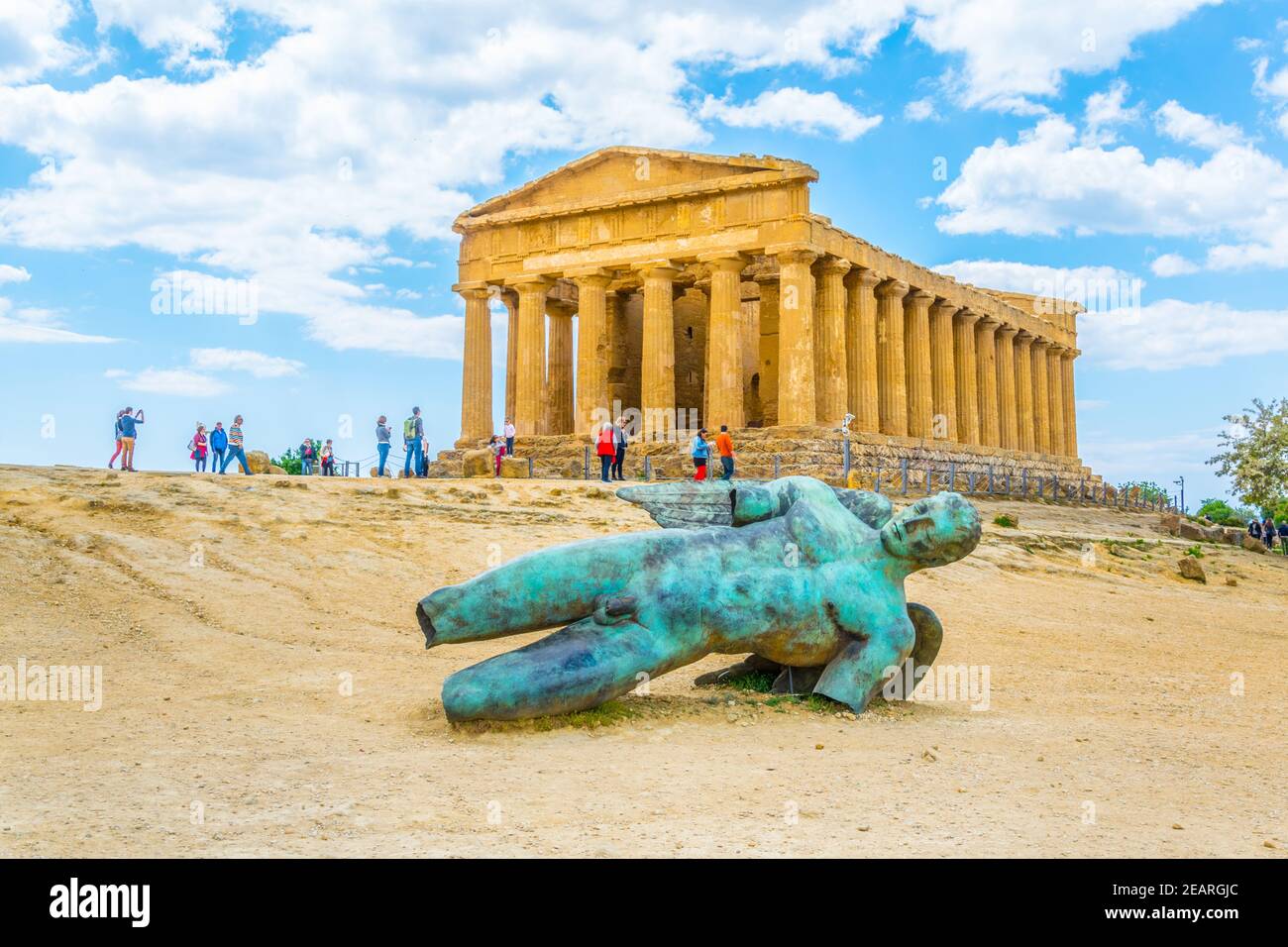Statue of fallen Icaro in front of the Concordia temple in the Valley of temples near Agrigento in Sicily, Italy Stock Photo