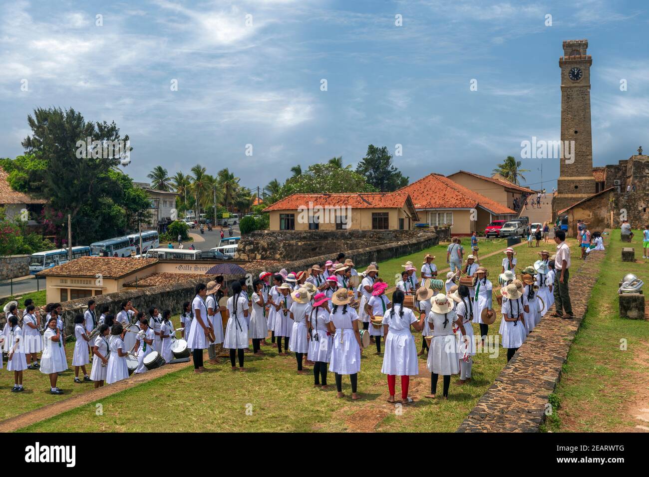 A Sri Lankan girls school band practice as they perform for the tourists at Galle Fort in Southern Sri Lanka. Stock Photo