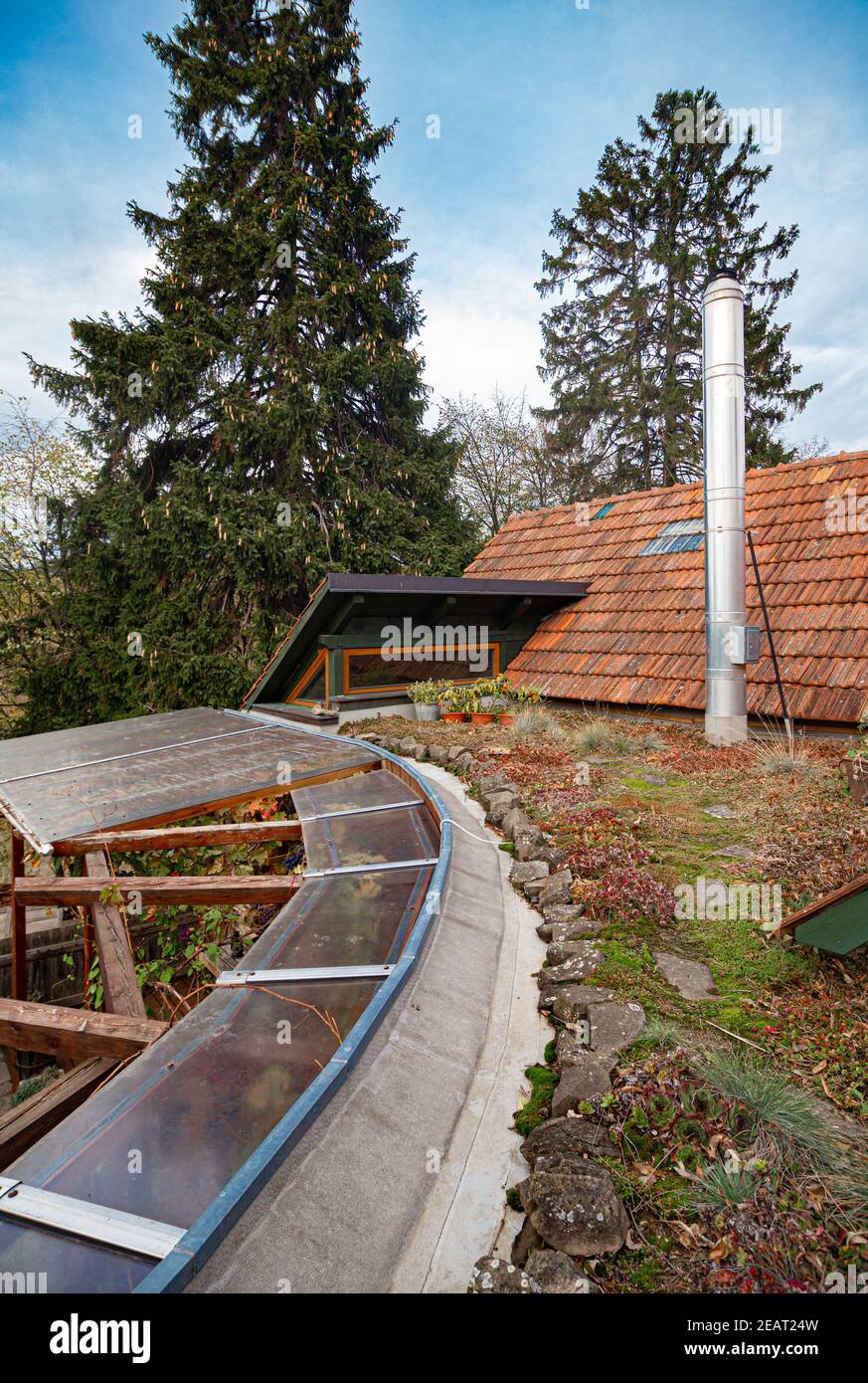 Green grass roof on a country house Stock Photo