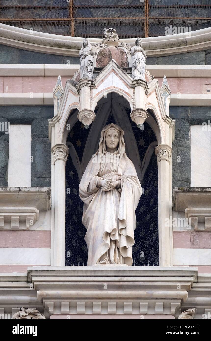 Statue on the portal of Basilica of Santa Croce (Basilica of the Holy Cross) - famous Franciscan church in Florence, Italy Stock Photo