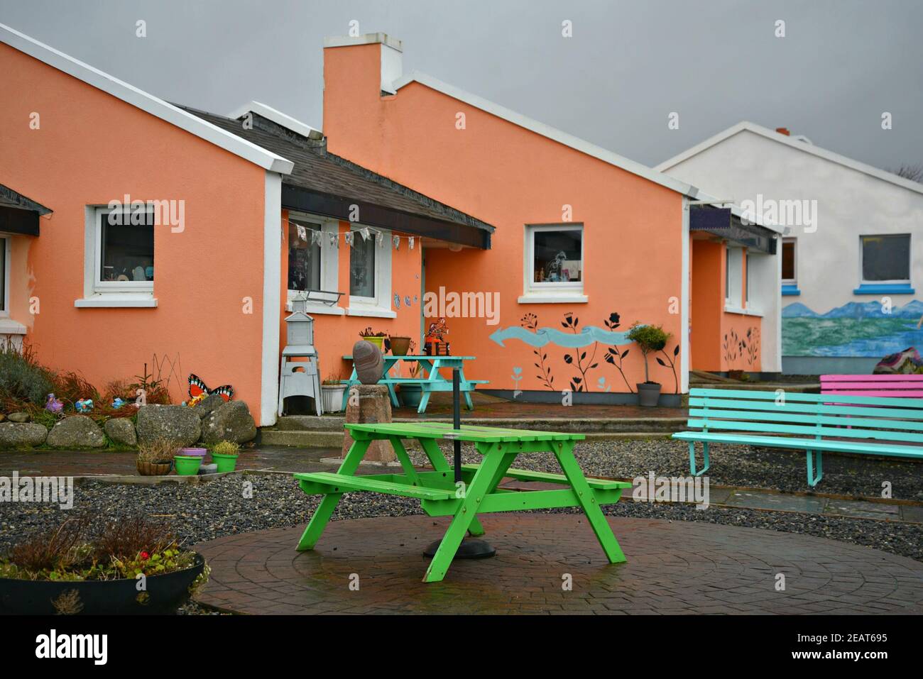 View of the colorful art shops and cafés in Ceardlann Spiddal Craft Village Galway County