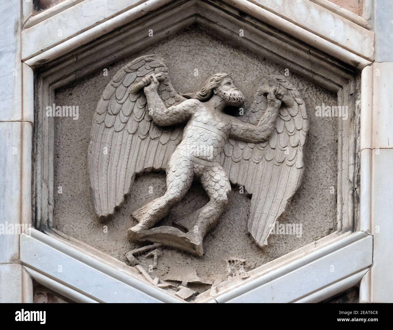 Daedalus as personification of mechanical arts from the workshop of Andrea Pisano, Relief on Giotto Campanile of Cattedrale di Santa Maria del Fiore (Cathedral of Saint Mary of the Flower), Florence, Italy Stock Photo